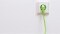 The picture shows a green power cable as a symbol for the use of green electricity with a wall heater