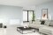 The picture shows a modern room with a wall convector as the electric heater.