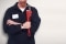 A heating contractor with tools in hand